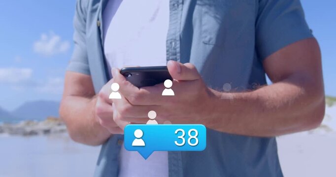 Animation of social media icons over smartphone with smartphone unk using smartphone