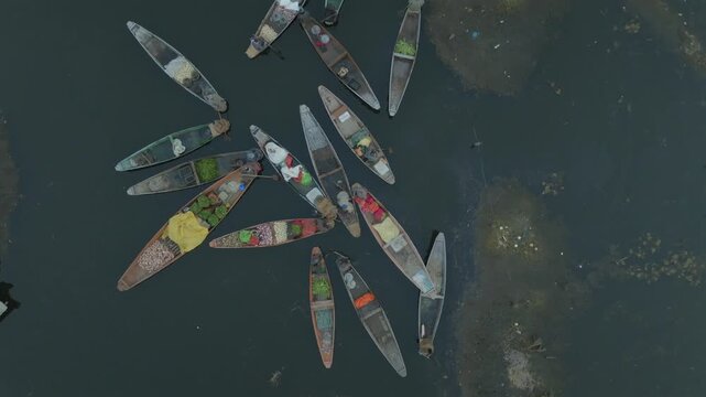 Aerial view of traditional boats and floating vendors on Dal Lake in Srinagar, Jammu and Kashmir, India