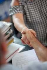 Accountant Consulting Client in Office