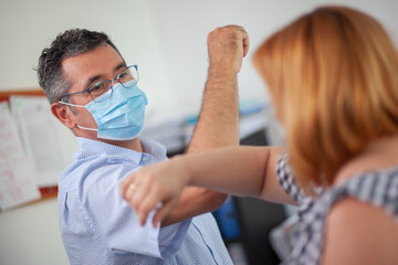 Accountant Consulting Client in Office