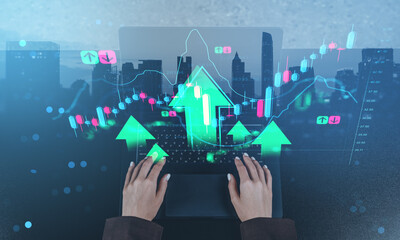 Hands typing on laptop with financial graphs, green arrows, and futuristic cityscape background representing investment growth and market concept rise.