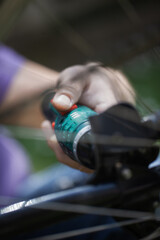 Middle Aged Man Repairing Bicycle at Home