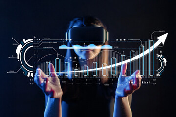 Woman Wearing Virtual Reality Headset Interacting with Futuristic Data Visualization and Graphs in a Dark Environment