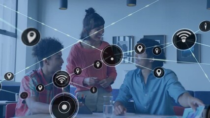 Animation of network of connections with wifi icons over diverse business people in office - Powered by Adobe