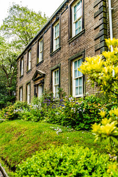 Exterior view of the Bronte Parsonage Museum in Haworth, the historic home where the Bronte sisters lived and wrote their celebrated novels, set on the edge of the Yorkshire moorland, Haworth, England