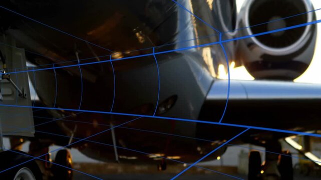 Jet engine intake and wing root showing blue grid overlay, turbine blades rotating in 3D render
