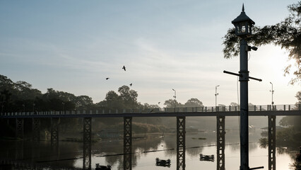 Wat Bot Bridge Over Sakae Krang River at Sunrise in Uthai Thani © Thanawat