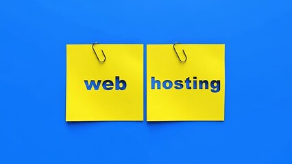 Two yellow sticky notes with cut-out blue letters spelling "web hosting" attached by paperclips to a vibrant blue background