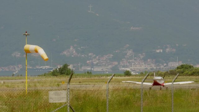 Wind indicators during a hot windless sunny day with views of the mountains