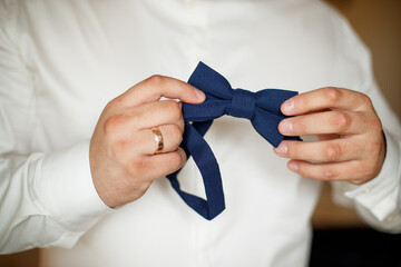 Tie a butterfly on a man