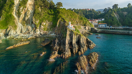 Lighthouse of Cudillero on Rocky Cliffs in Asturias © Mazur Travel