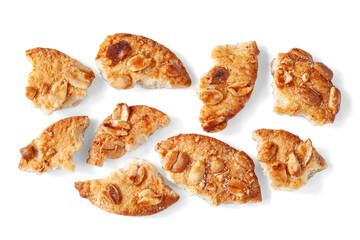 Broken cookies. Close-up of cookie pieces on a white. View from above