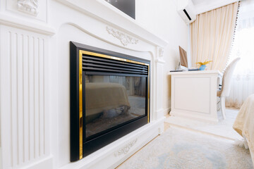 Opulent fireplace setting exudes warmth and sophistication