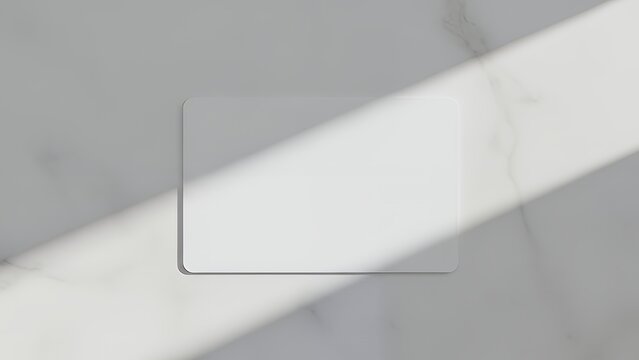 A close-up shot of a white marble surface with a subtle shadow and a transparent rectangle overlay - Powered by Adobe