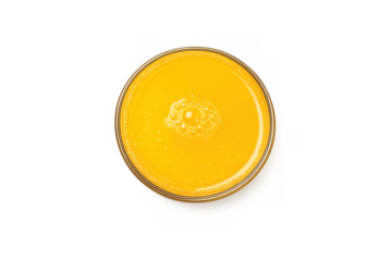 Bright yellow orange juice in glass with bubbles - minimalistic design for refreshments and beverages