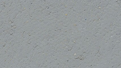 Rough textured gray concrete surface with subtle cracks and small aggregate inclusions, providing a weathered and industrial backdrop.