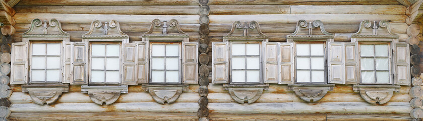 old wooden arched windows panorama.