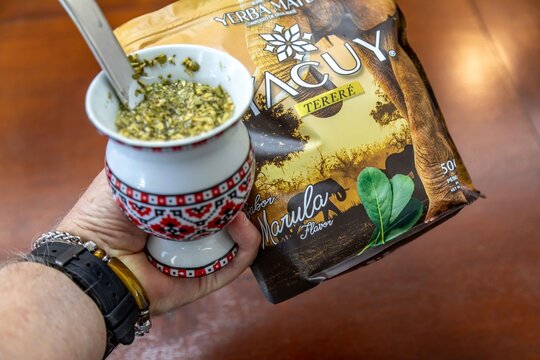 Brazil, January 17, 2026. Traditional yerba mate terer&eacute; with Amarula flavor served in a Ukrainian porcelain gourd.