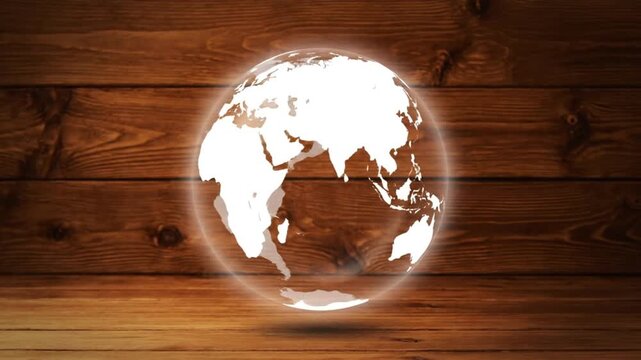 Glowing globe on wooden background for business or travel concepts