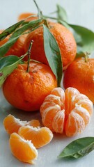Fresh tangerines with green leaves and peeled segments, showcasing vibrant color and juicy texture, perfect for healthy food and commercial advertising