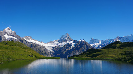Lake Bachalpsee with reflecting Mountains, Lauteraarhorn, Schreckhorn, Finsteraarhorn, Grindelwald, Alps, Berne, Switzerland