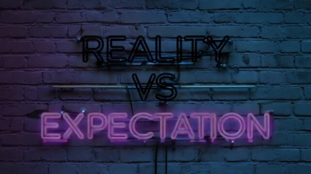 Neon sign reading "reality vs expectation".
