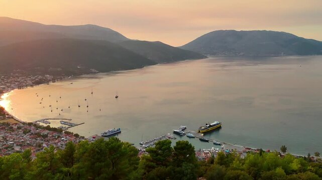 Aerial drone view of Sami harbor at sunset, Kefalonia, Greece