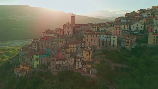 Aerial view of Colledimezzo at sunset overlooking Lake Bomba