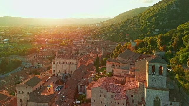 Aerial view of historic Gubbio town at sunset in Umbria, Italy