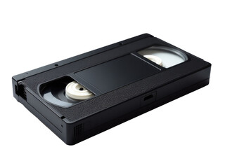 A black video cassette sits on a white surface, waiting for playback