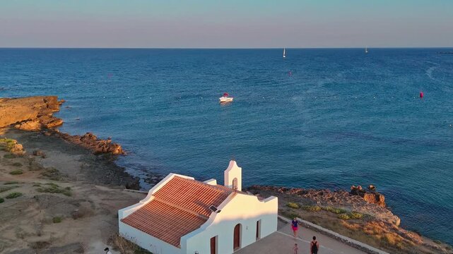 Aerial drone view of Chapel of Agios Nikolaos at St. Nicholas Bea...
