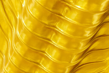 wavy gold texture for background and design.