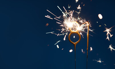 81 years anniversary celebration festive background made with Bengal fires in the form of number Eighty one.