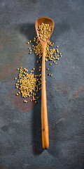  Fenugreek seeds on graphite background