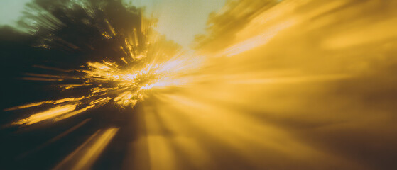 Yellow light leak streaks across a vintage film frame with motion blur and grain texture abstract background creative style