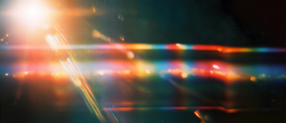 Vintage film light leak with rainbow scratches and colorful grain on textured retro background creative abstract style