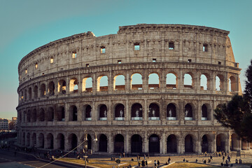 Naklejka premium Colosseum Rome Italy Ancient Roman Amphitheater at Sunset