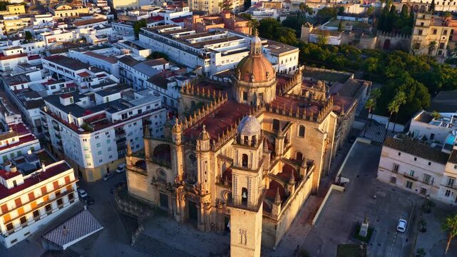 flying above Cathedral de Jerez de la Frontera at sunset in Andalusia, Spain, aerial view of Jerez de la Frontera town, tourism in Andalusia