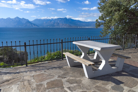 Bench on a seaside. Bench sea and mountains. picnic bench on the sea
