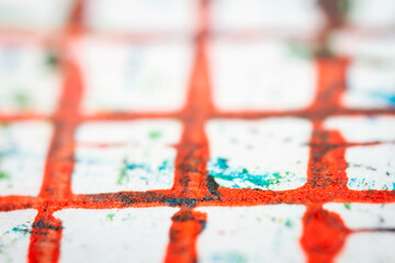 Extreme close up of colorful acrylic paint texture showing brush strokes. Selective focus.