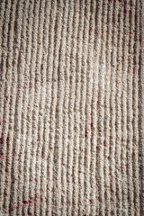 Gray lined stucco street wall texture background. Architectural detail.