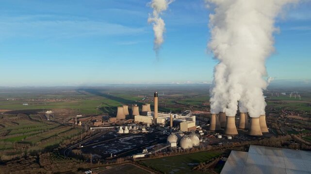 aerial coal fired power station in countryside 