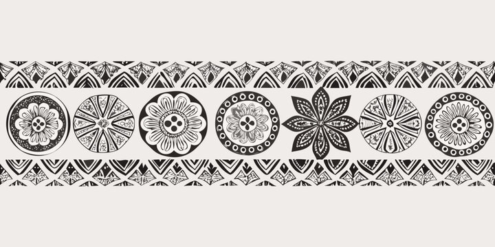 Intricate black and white floral and geometric pattern repeating as a decorative border