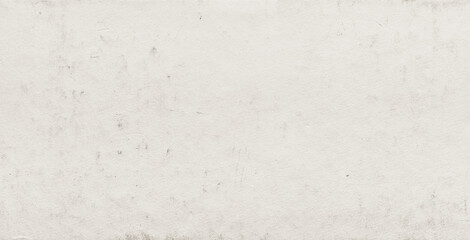 Grunge beige colored paper background with dirt scuffs and scratches