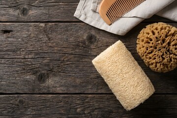 Natural Luffa Loofah and Sea Sponge on Rustic Wooden Table Top View