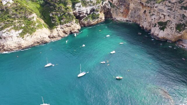 Aerial view of the anchorage and cliffs in Black Cape, in the Mediterranean village of Javea, Spain. 