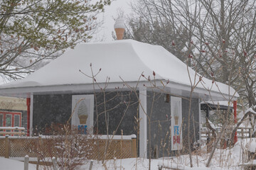 Obraz premium ice cream cabin near The Grenadier Cafe in High Park during a snow storm on 2026-01-15
