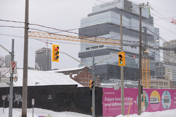 Obraz premium site of future Metrolinx Ontario Line Corktown Station near King St E, Berkeley St, Parliament St with view of The Globe and Mail Centre at 351 King St E, Toronto