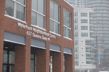 Naklejka premium exterior building facade and sign of Harbourfront Community Centre (Waterfront Neighbourhood Centre) located at 627 Queens Quay W, Toronto
