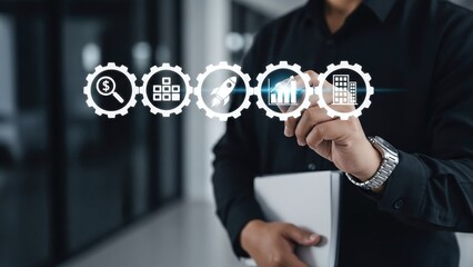 Person holding a notebook while interacting with glowing conceptual business gears showing innovation and growth.